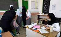اجرای طرح مشترک غربالگری و آموزش بهداشت در مدارس شهید رفیعی و شهید بهشتی طالقان